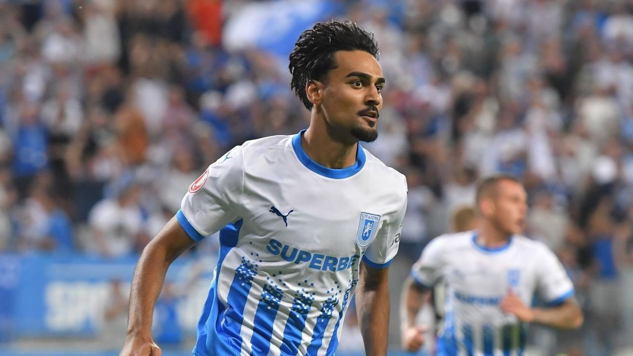 A Craiova player moves forward during a European match