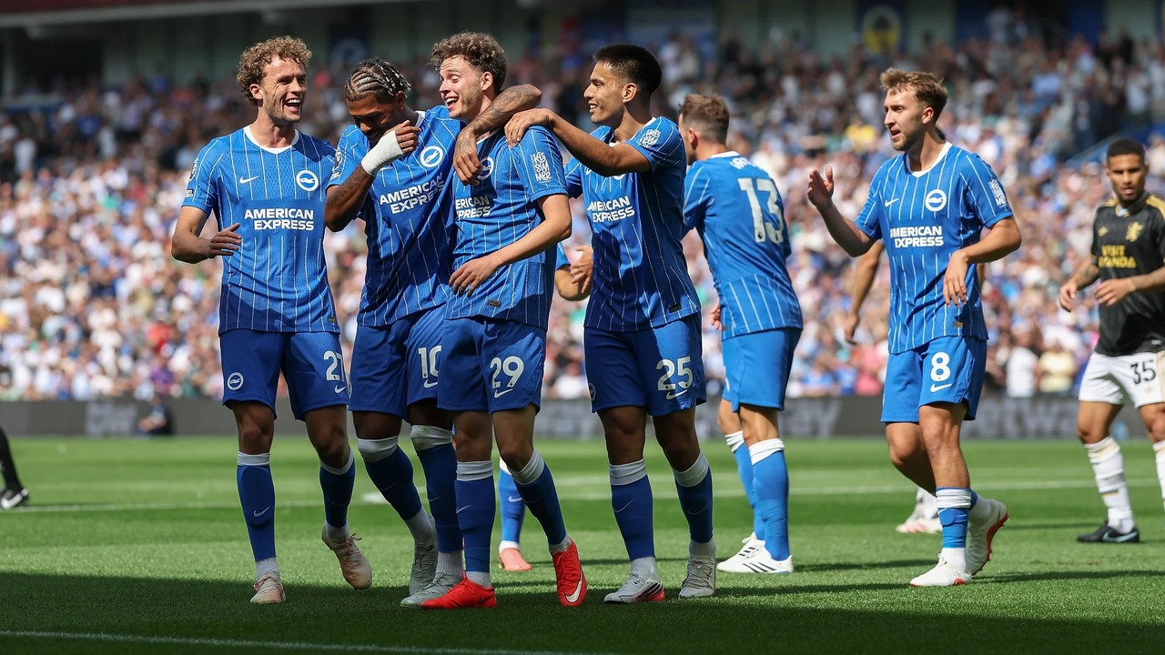 Brighton players celebrate an early goal against Aston Villa