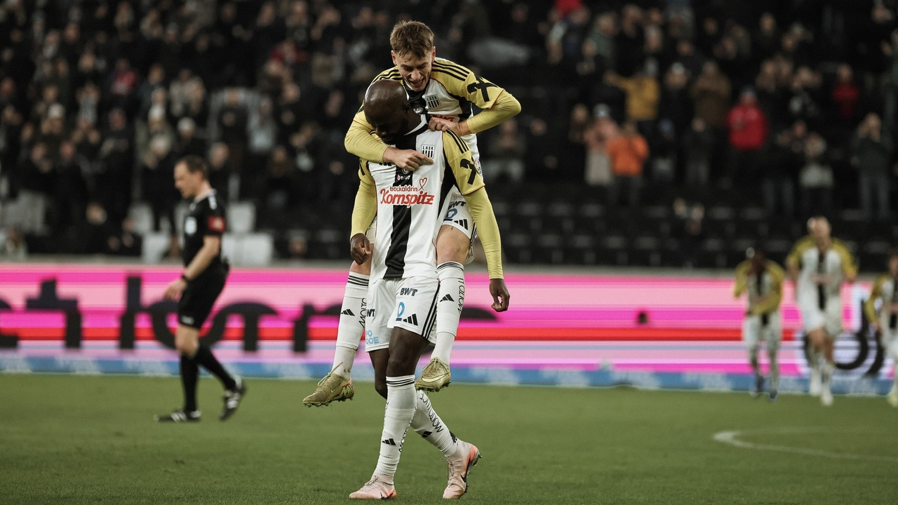 A LASK player controls the ball during a competitive match