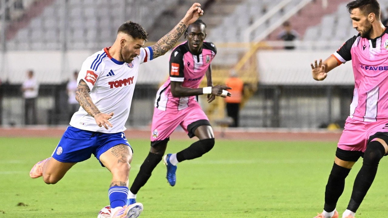 Hajduk Split and Rakow players compete for possession