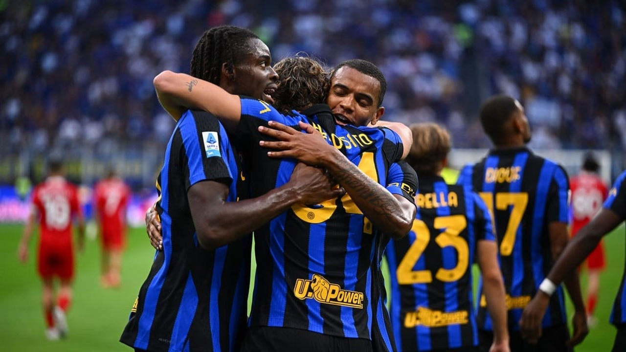 Inter players gather after a goal against Monza