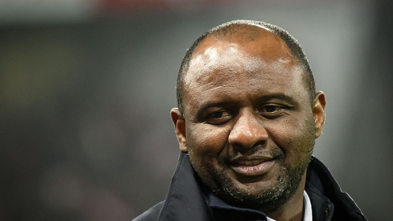 Patrick Vieira watches a football match