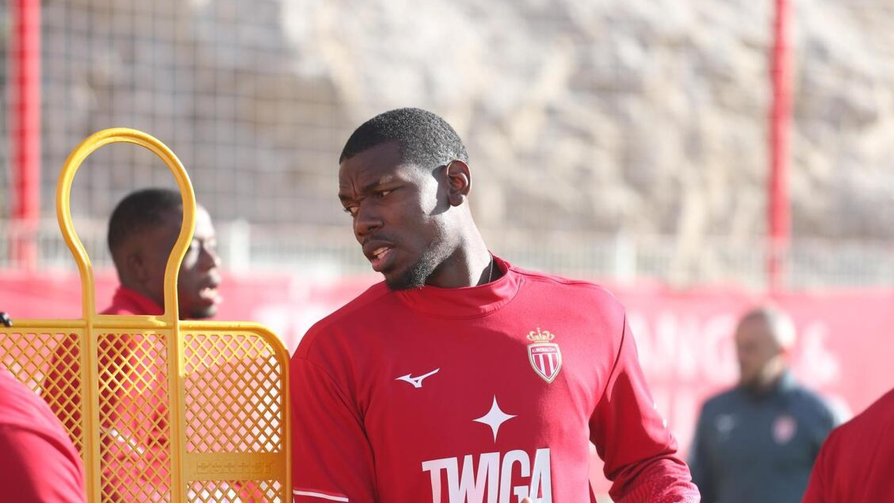 Paul Pogba stands beside training equipment in Monaco clothing