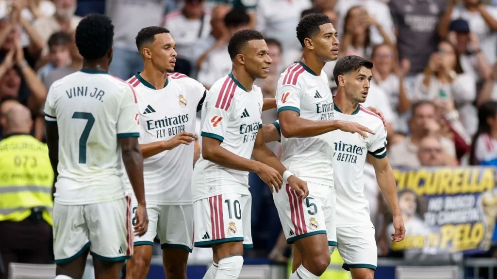 Real Madrid score three early goals and finish Malaga with a fourth