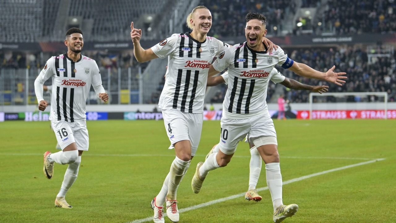 LASK players gather together after a match